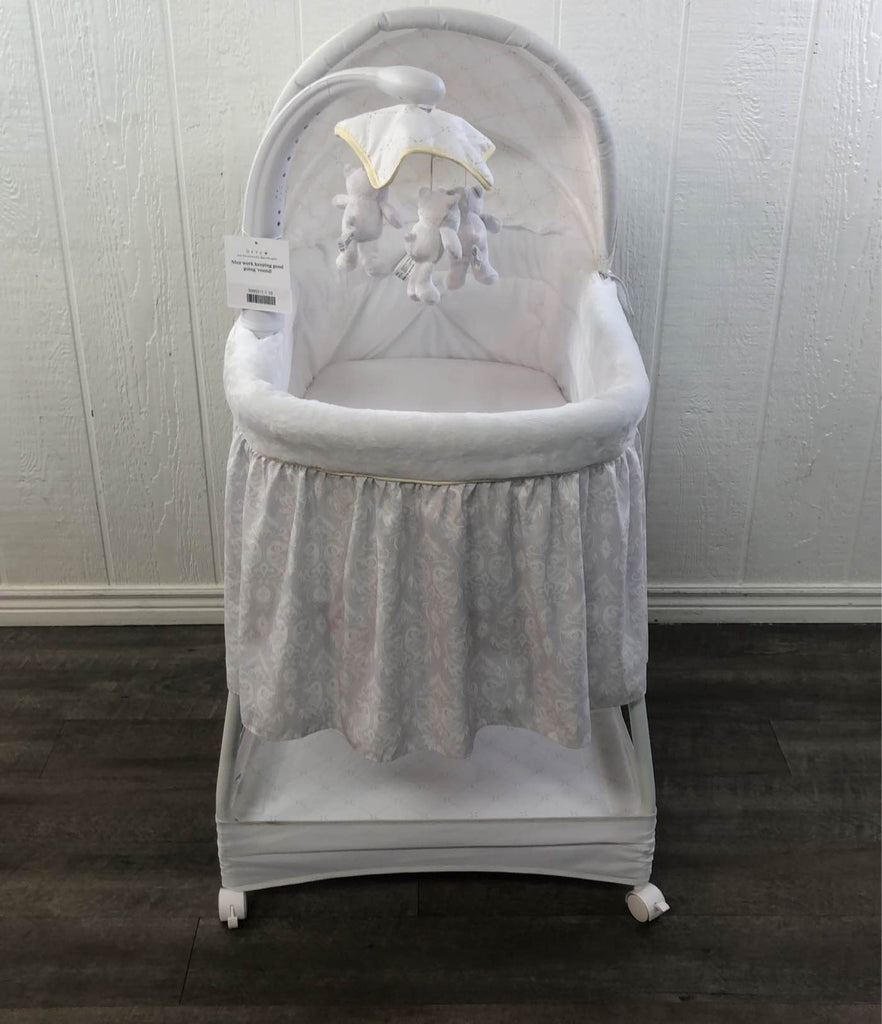 Silent auto clearance gliding deluxe bassinet