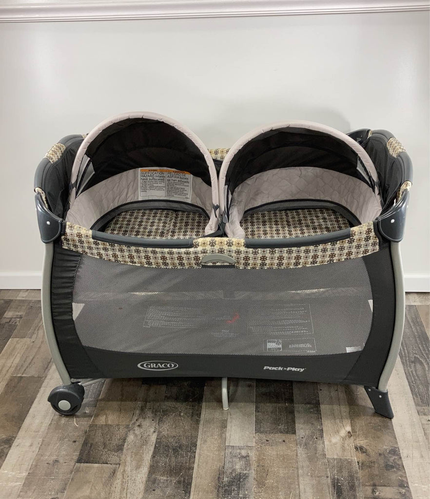 Graco pack and shop play twin bassinet