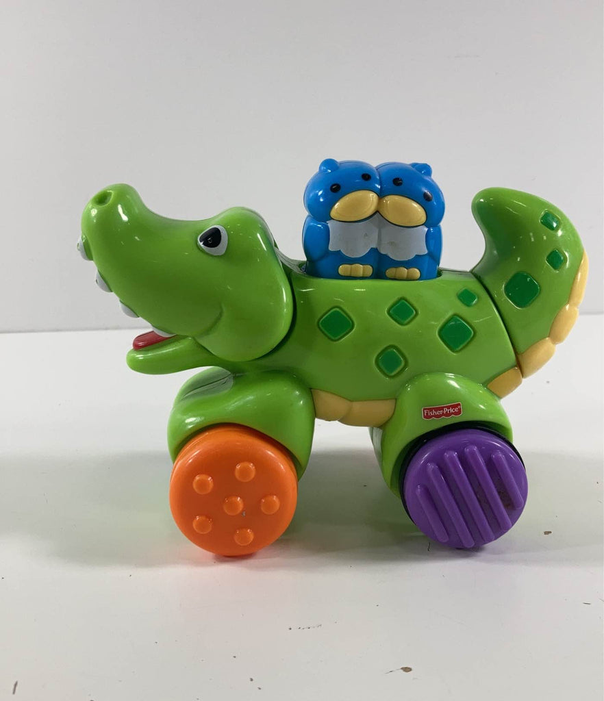 Fisher price press hot sale and go crocodile