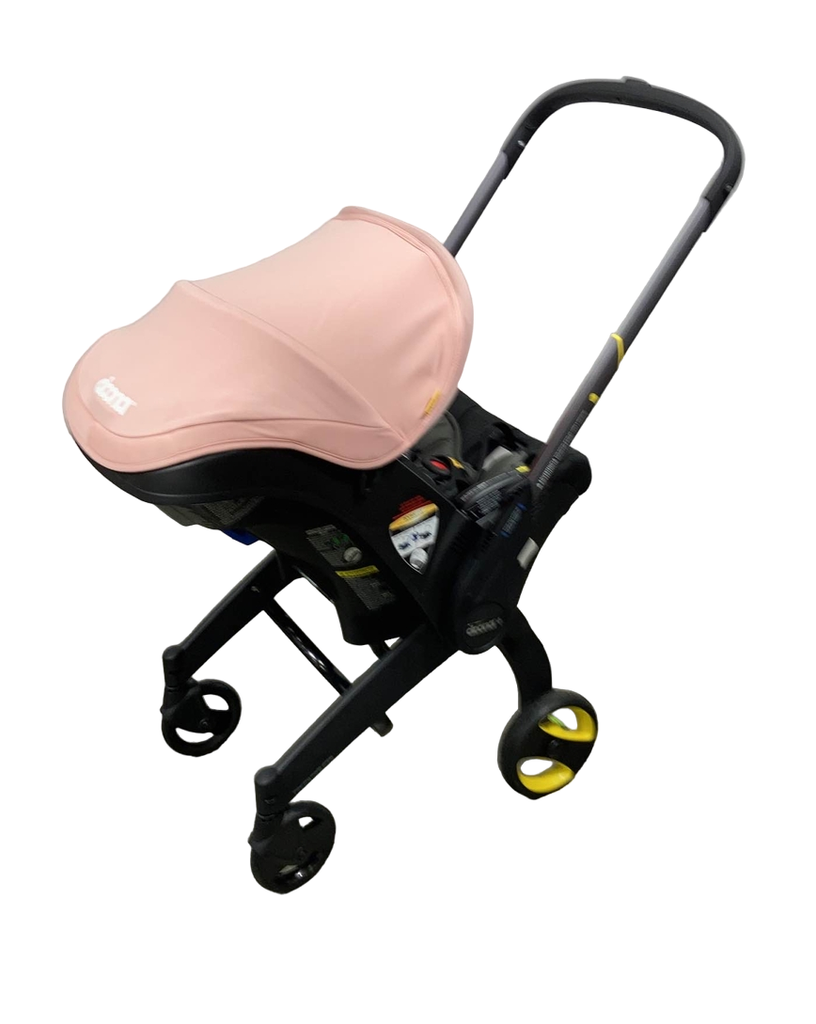 Blush pink doona top stroller