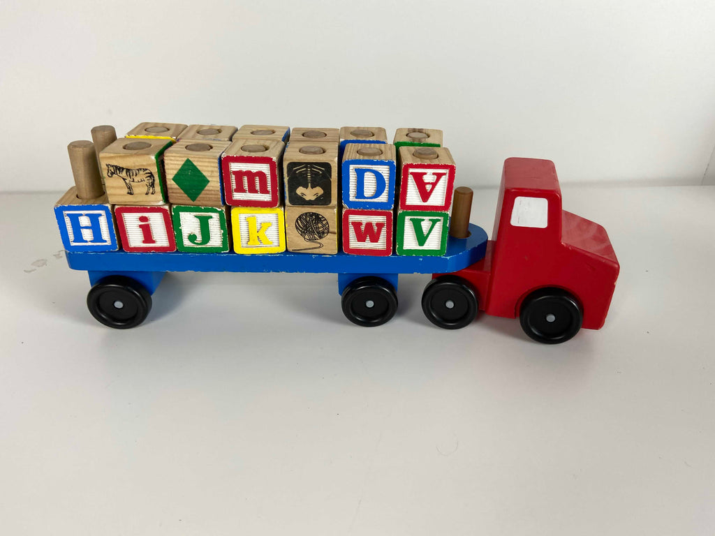 Melissa and doug alphabet online blocks wooden truck