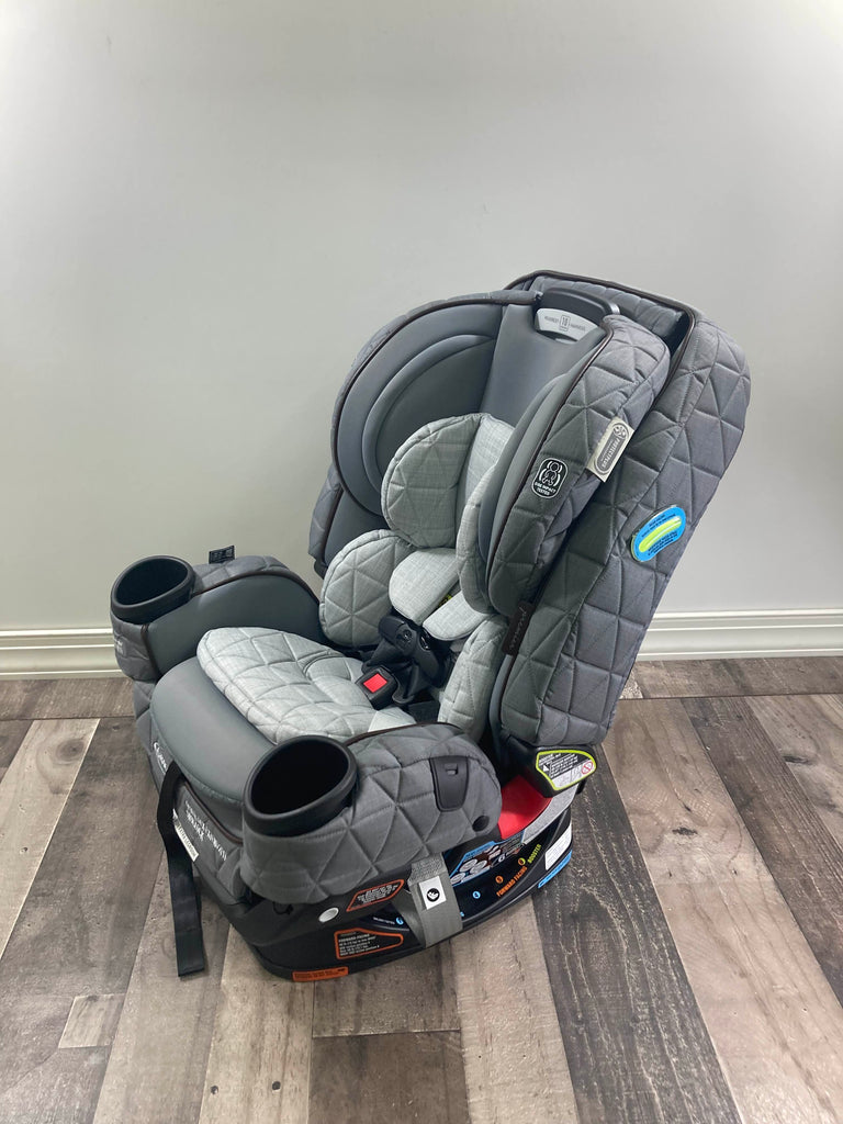 Graco Premier 4Ever DLX Extend2Fit SnugLock 4in1 Car Seat featuring