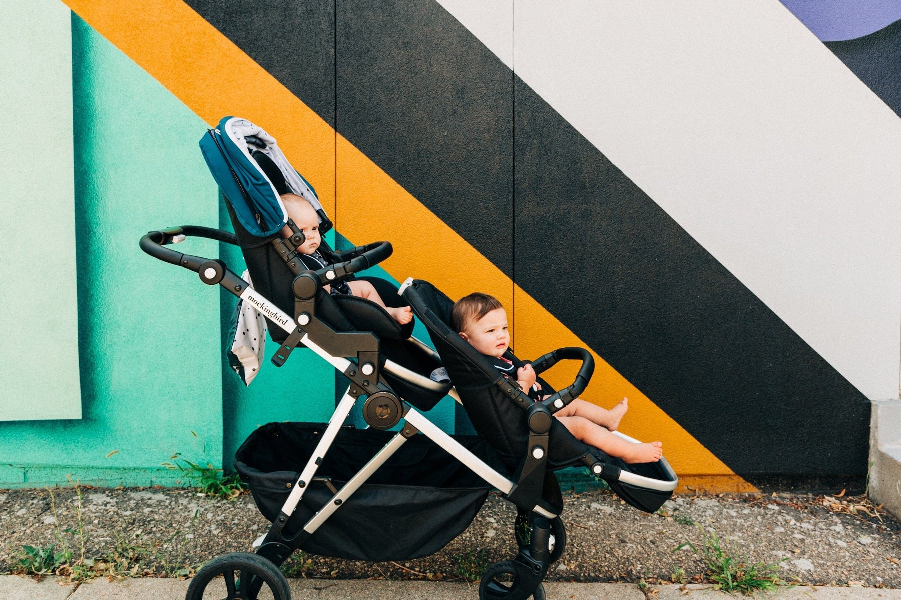 Mockingbird single to double stroller with two kids in it