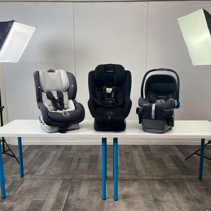 Three non-toxic car seats next to each other