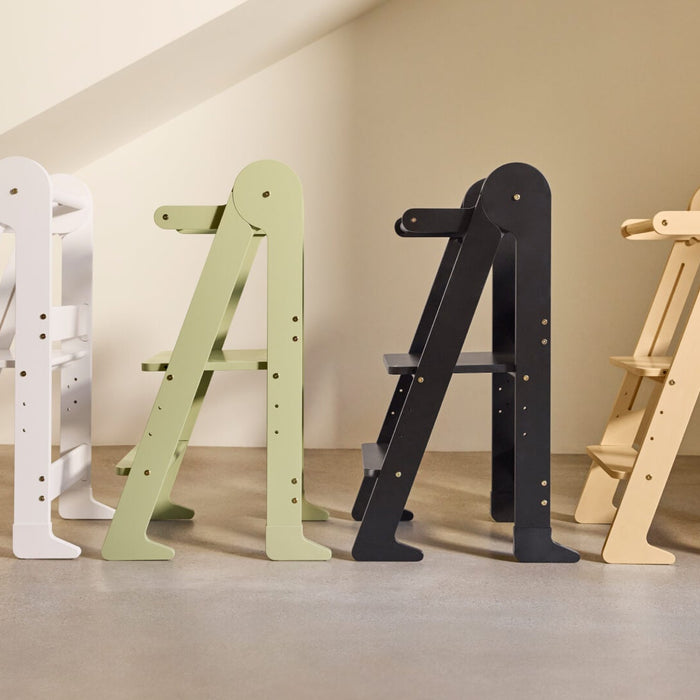 Four Piccalio toddler towers in different colors lined up next to eachother