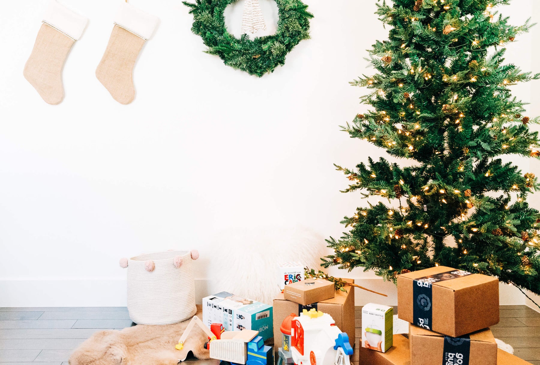 sustainable christmas presents under a christmas tree