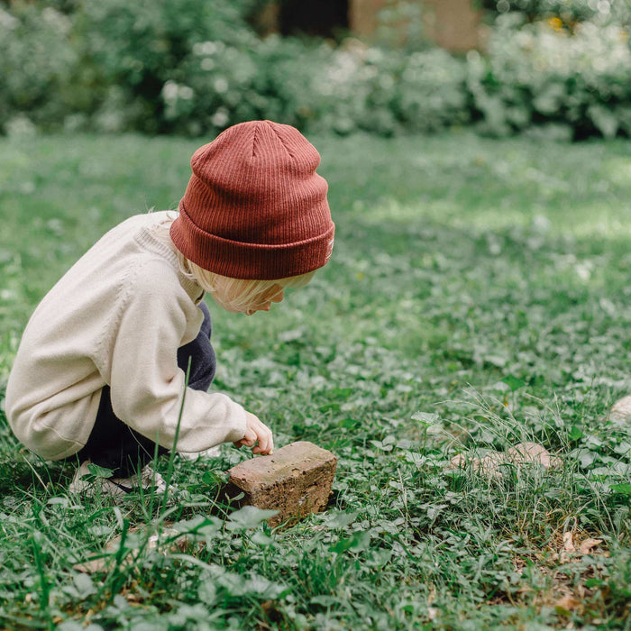 toddler exploring outdoors 