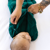 Shop Dreamland Weighted Sleep Swaddle, Size 0-6 Months, Various Colors at GoodBuy Gear