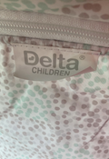 Shop Delta Children EZ Fold Ultra Compact Travel Bassinet at GoodBuy Gear