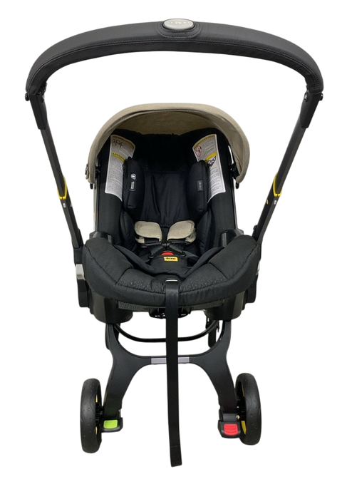 Shop Doona Infant Car Seat & Stroller Combo, 2024, Warm Stone at GoodBuy Gear