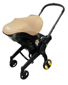 Shop Doona Infant Car Seat & Stroller Combo, 2024, Sahara Sand at GoodBuy Gear
