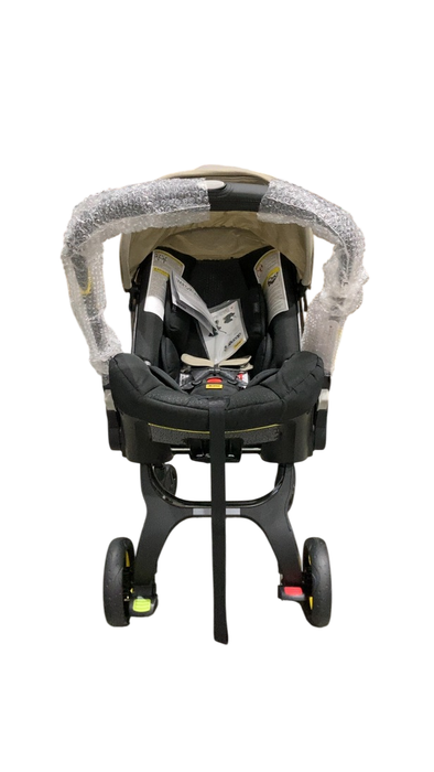 Shop Doona Infant Car Seat & Stroller Combo, 2023, Limited Edition Beige/Warm Stone at GoodBuy Gear