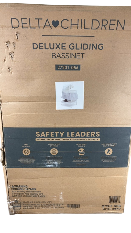 Shop Delta Children Deluxe Gliding Bassinet, Silver Lining at GoodBuy Gear