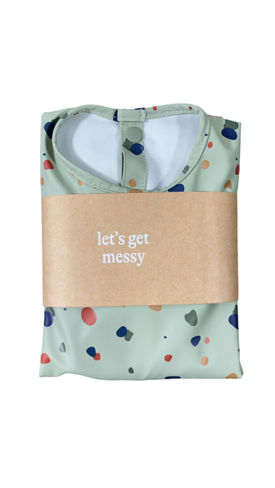 Shop Lalo Smock Bib, Sage Pebble at GoodBuy Gear