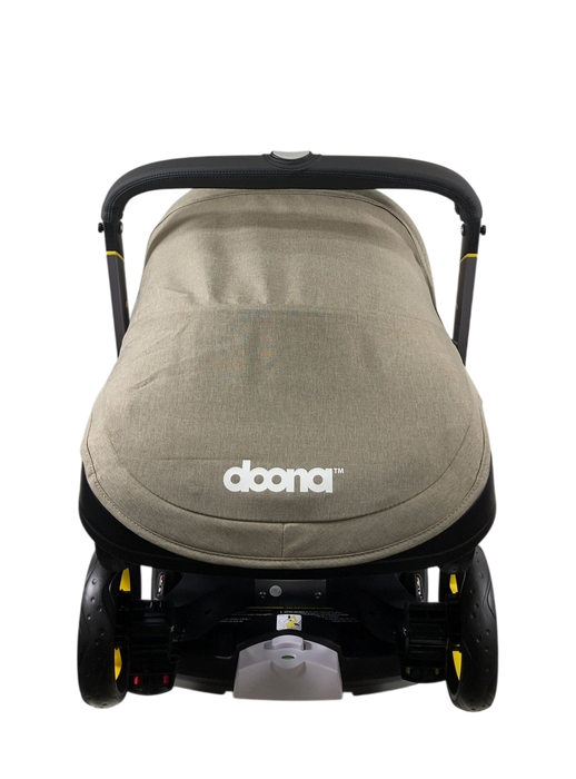 Shop Doona Infant Car Seat & Stroller Combo, 2024, Warm Stone at GoodBuy Gear