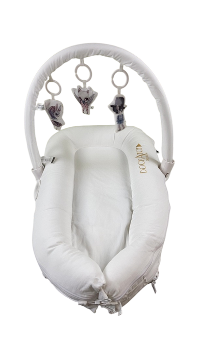 Shop DockATot Deluxe+ Dock with Toy Arch, Pristine White, White Arch w/ Cloud Friends at GoodBuy Gear