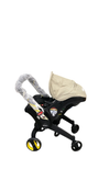 Shop Doona Infant Car Seat & Stroller Combo, 2023, Limited Edition Beige/Warm Stone at GoodBuy Gear