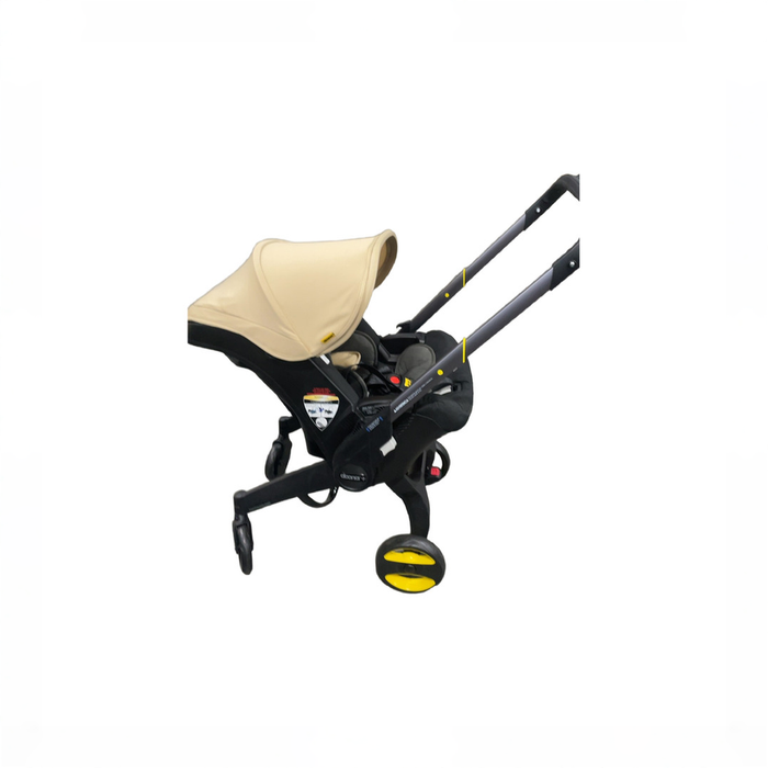 Shop Doona Infant Car Seat & Stroller Combo, 2025, Sahara Sand at GoodBuy Gear