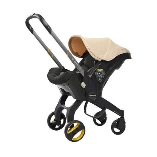 Shop Doona Infant Car Seat & Stroller Combo, 2025, Sahara Sand at GoodBuy Gear