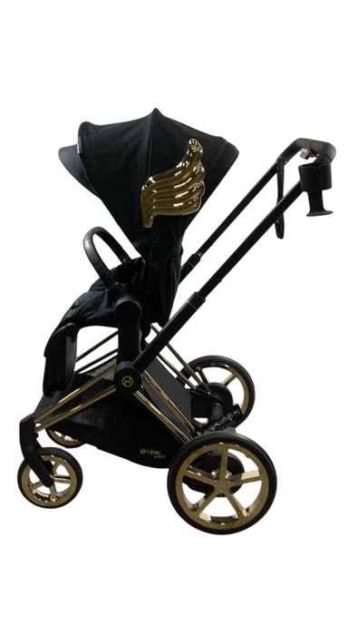 Shop Cybex E-PRIAM Electric Stroller, 2022, Gold With Black Details, Wings By Jeremy Scott, with Battery at GoodBuy Gear