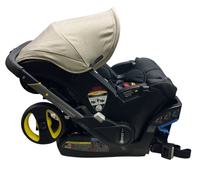 Shop Doona Infant Car Seat & Stroller Combo, 2024, Warm Stone at GoodBuy Gear