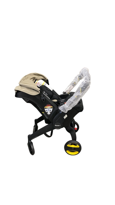 Shop Doona Infant Car Seat & Stroller Combo, 2023, Limited Edition Beige/Warm Stone at GoodBuy Gear