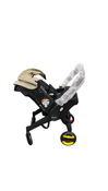 Shop Doona Infant Car Seat & Stroller Combo, 2023, Limited Edition Beige/Warm Stone at GoodBuy Gear
