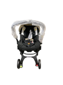 Shop Doona Infant Car Seat & Stroller Combo, 2024, Limited Edition Beige/Warm Stone at GoodBuy Gear