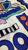 Shop Etta Loves Reversible Sensory Playmat, Camille Walala at GoodBuy Gear