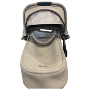 Shop Silver Cross Reef First Bed Folding Bassinet, Frappe at GoodBuy Gear