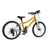 Shop Woom 4 Bike 20", Sunny Yellow at GoodBuy Gear