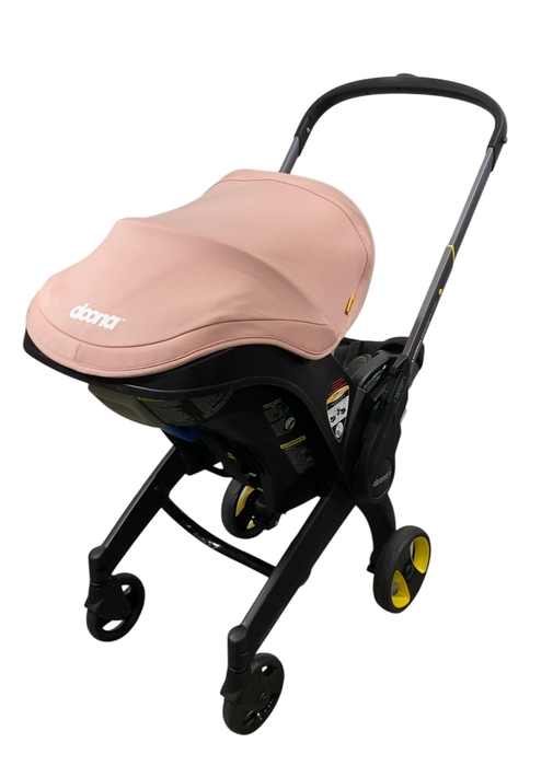 Shop Doona Infant Car Seat & Stroller Combo, 2024, Blush Pink at GoodBuy Gear