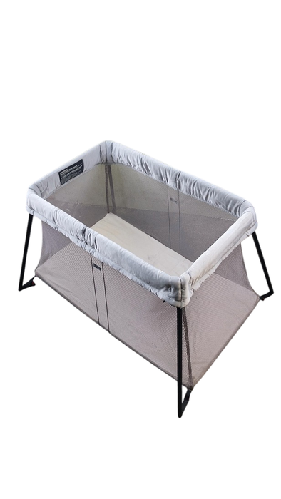 Shop BabyBjorn Travel Crib Light Bundle with Fitted Sheet, Silver at GoodBuy Gear