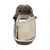 Shop Silver Cross Reef First Bed Folding Bassinet, Frappe at GoodBuy Gear