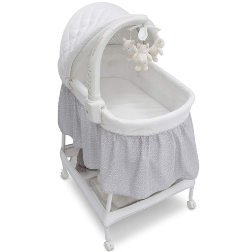 Shop Delta Children Deluxe Gliding Bassinet, Silver Lining at GoodBuy Gear