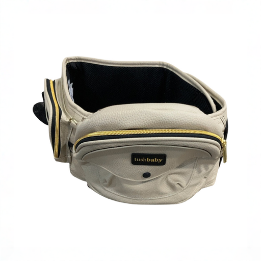 Shop TushBaby Hip Baby Carrier, Vegan Leather Cream at GoodBuy Gear
