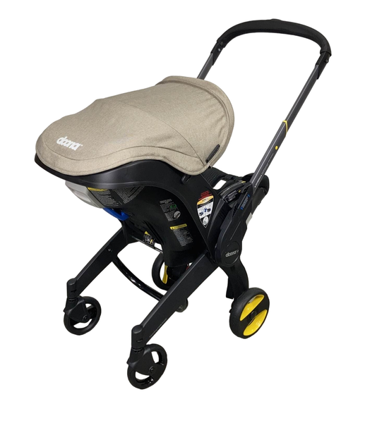 Doona Infant Car Seat & Stroller Combo, 2023, Warm Stone