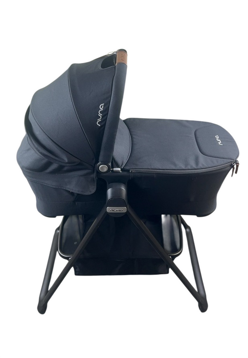 Shop Nuna SWIV & TRIV Series Bassinet + Stand, Caviar at GoodBuy Gear