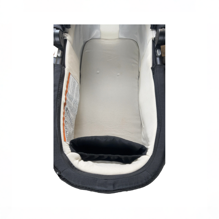 Shop Nuna SWIV & TRIV Series Bassinet + Stand, Caviar at GoodBuy Gear