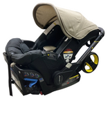 Shop Doona Infant Car Seat & Stroller Combo, 2024, Warm Stone at GoodBuy Gear