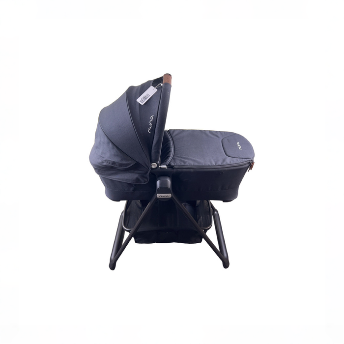 Shop Nuna SWIV & TRIV Series Bassinet + Stand, Caviar at GoodBuy Gear