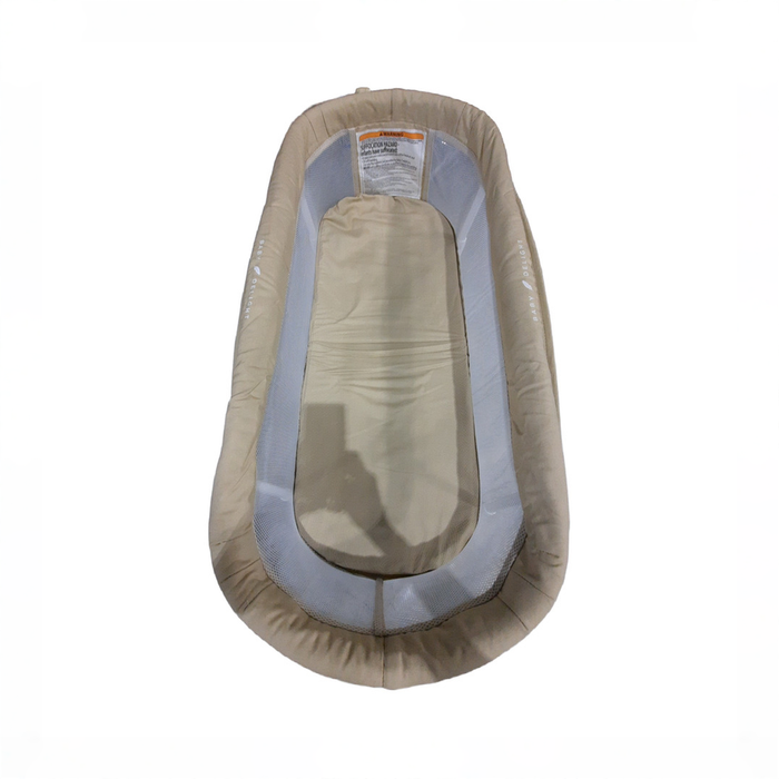 Shop Baby Delight Snuggle Nest Portable Infant Bassinet, Organic Oat at GoodBuy Gear