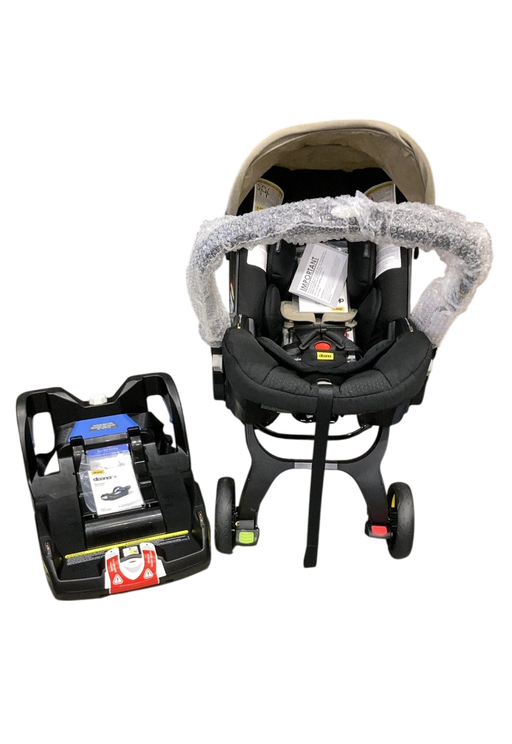 Shop Doona Infant Car Seat & Stroller Combo, 2023, Limited Edition Beige/Warm Stone at GoodBuy Gear