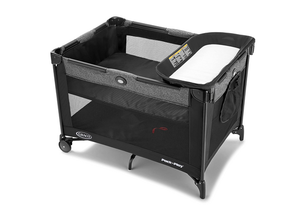 Graco Pop-Up Portable Play travel crib in black and gray with a white mattress pad, shown on a white background.