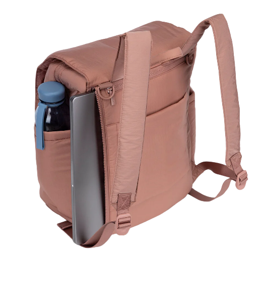 Pink backpack with a laptop compartment on a white background