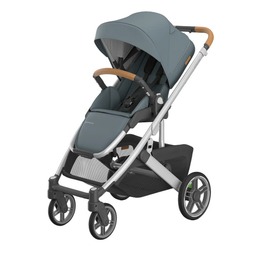 Gray and black stroller with brown handles on a white background