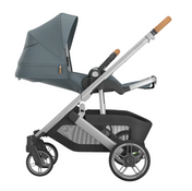 Gray and black stroller with a canopy on a white background