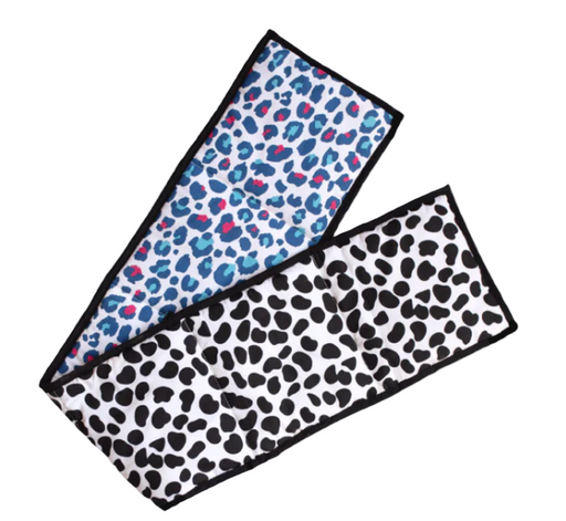 Two leopard print towels, one blue and pink, one black and white, on a light gray background.