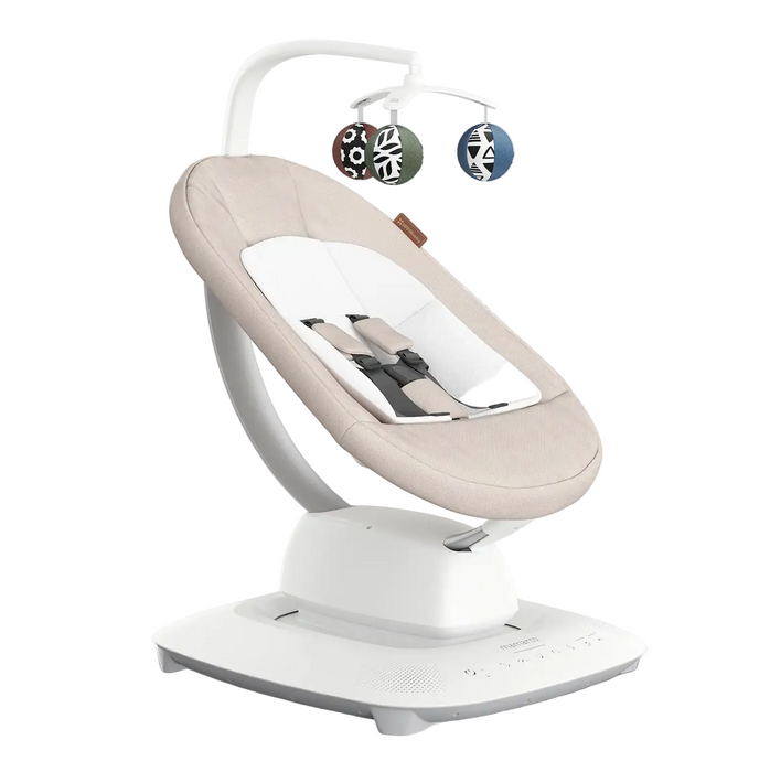 Baby swing with a white base and beige seat on a white background