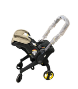 Shop Doona Infant Car Seat & Stroller Combo, 2024, Limited Edition Beige/Warm Stone at GoodBuy Gear